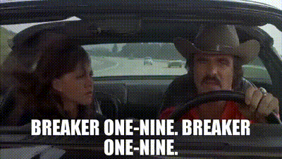 Smokey and the Bandit clip, woman and mustache guy in a car who is on the cb handset saying breaker 1 9