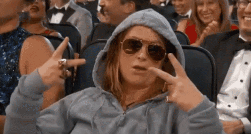 Lady in hoodie with dark sunglasses