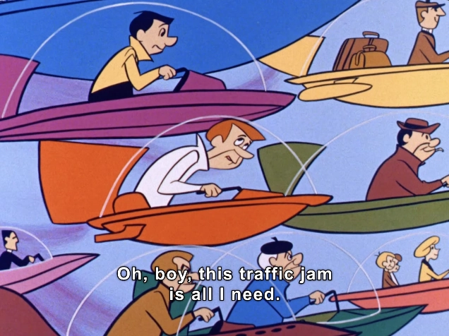 The image features a colorful, animated scene depicting a futuristic traffic jam in the sky. Various characters are piloting sleek, hovering vehicles that resemble small flying cars, which come in an array of bright colors, including orange, blue, and green. 

The main character, with distinctive red hair and wearing a white shirt, looks exasperated as he navigates through the congestion, expressing his frustration with the caption: "Oh, boy, this traffic jam is all I need." 

The background is filled with a stylized blue sky, accentuating the whimsical and light-hearted nature of the illustration, reminiscent of classic futuristic animation. The overall atmosphere is one of playful chaos, highlighting the comedic side of everyday frustrations even in a high-tech world.
