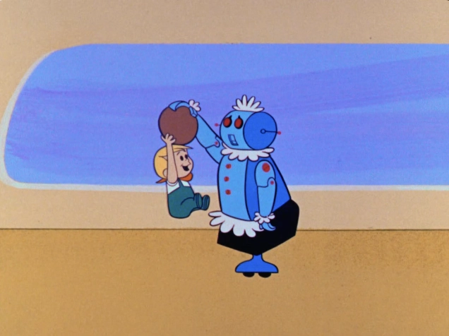 The image features a whimsical scene with a playful interaction between a young child and a friendly-looking robot. The child, with short, blonde hair, is suspended mid-air as the robot lifts him by holding onto a brown object—likely a ball. The robot is depicted in a bright, cartoonish style, featuring a blue body with red buttons and a frilly white apron, emphasizing its nurturing demeanor. The background is simple, comprising a soft beige floor and a light blue window, creating a cheerful, light atmosphere. This imagery evokes a sense of fun and innocence, highlighting the bond between humans and technology in a playful manner.