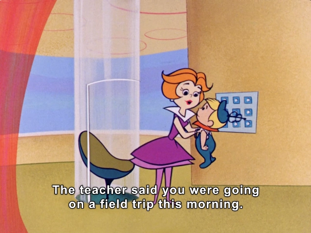 In this animated scene, a cheerful woman with vibrant orange hair and a stylish purple dress embraces a small child with blue hair. The setting is futuristic and colorful, featuring a sleek curved chair in the foreground and large windows with pastel backgrounds that evoke a light, spacious feel. The woman, possibly a mother or caregiver, speaks gently to the child, informing them about an upcoming field trip. The dialogue is displayed prominently at the bottom, enhancing the narrative's context. The overall atmosphere suggests warmth, care, and excitement about the day’s adventure.

"The teacher said you were going on a field trip this morning"