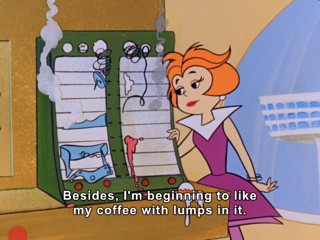 The image depicts a vibrant scene from an animated series featuring a character with orange hair styled in soft waves. She is dressed in a chic, purple dress with a distinctive white collar. The character appears to be interacting with a futuristic kitchen appliance that has a whimsical design, displaying chaotic elements such as bubbles and mixed colors, suggesting a malfunction. The appliance is adorned with animated features, making it stand out in the setting. The dialogue below reads, "Besides, I'm beginning to like my coffee with lumps in it," hinting at a humorous and playful tone typical of animated shows. The background includes bright colors and shapes that enhance the lighthearted atmosphere of the scene.