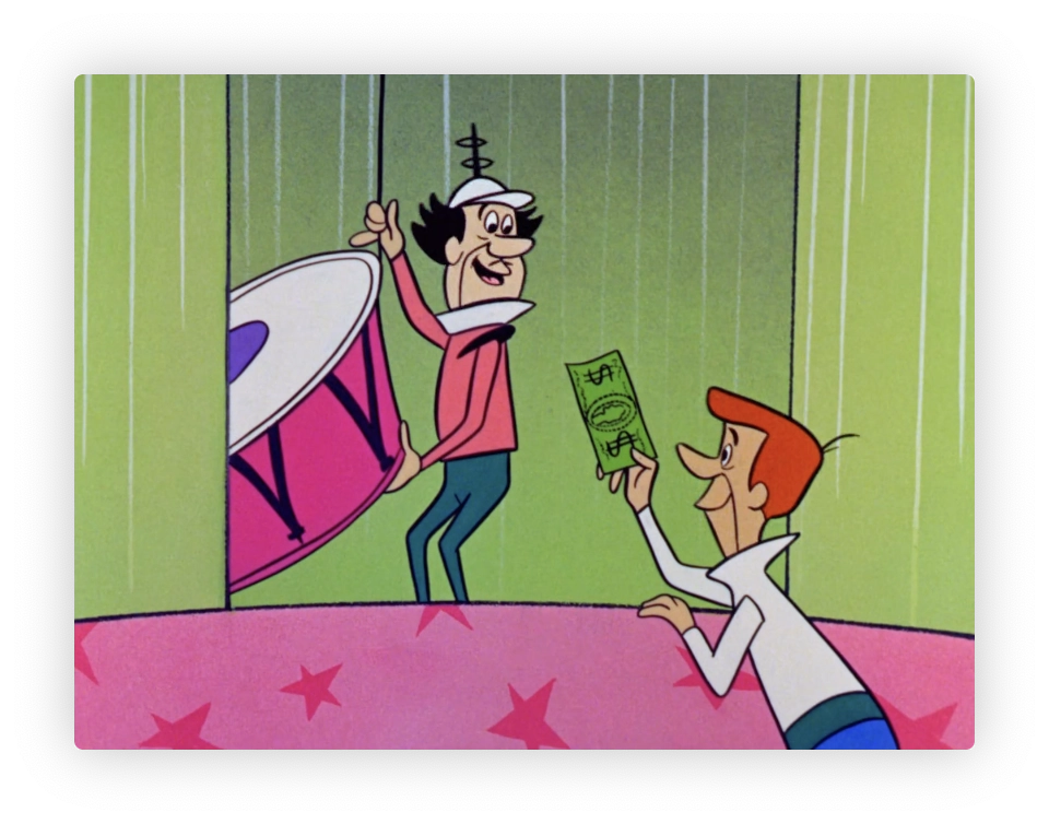This image features two animated characters. On the left, there’s a character holding a large drum, ecstatic with some sort of victory or achievement, wearing a pink and coral outfit with a cap. On the right, George Jetson in a white shirt and orange pants kneels, offering a wad of money or tickets to the other character. The setting appears festive with a spotlight indicating a celebratory or performance scenario, emphasized by the star-adorned pink stage on the bottom.

AKA George is tipping the chippendales dancer, in hopes to go back stage with him.