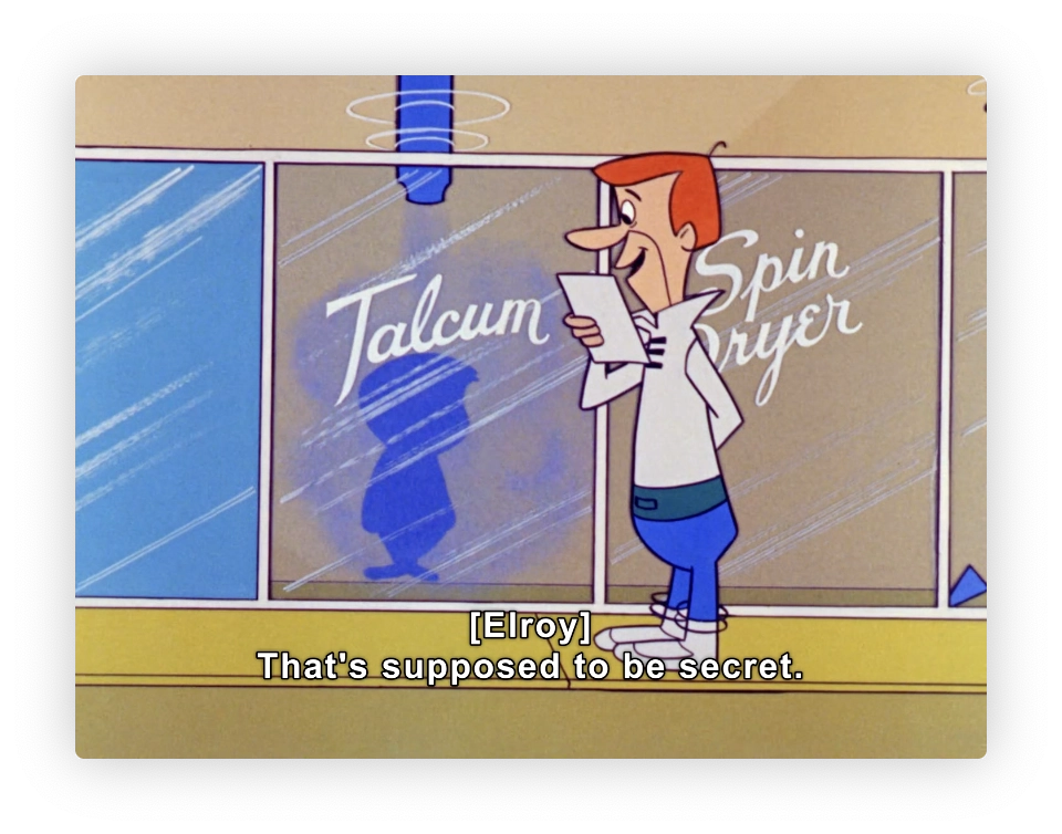 This is an image from an animated show, depicting a scene where a character, apparently named George Jetson, is standing outside of a room with large glass windows. Inside the room is a machine labeled "Talcum Spin Dryer." The character is smiling and looking at a document or clipboard. A caption at the bottom reads, "[Elroy] That's supposed to be secret," suggesting that the character is discussing something confidential. The overall setting is colorful and styled in a typical mid-20th century animation design.