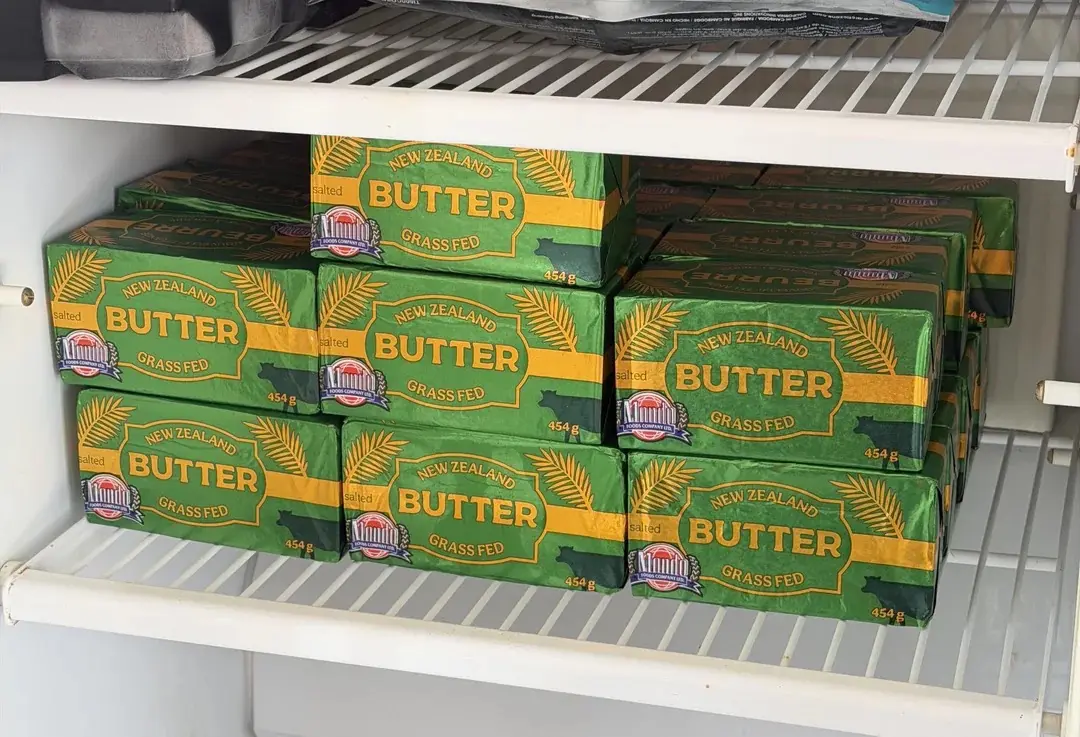 bricks of butter in a fridge
