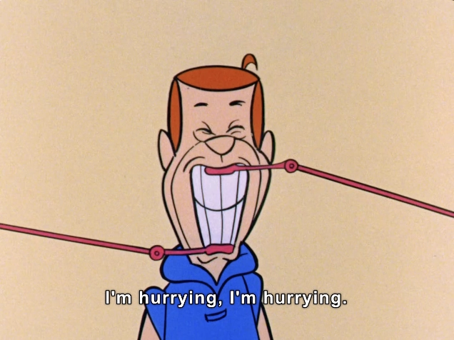 The image features an animated character with a bright smile, actively expressing urgency with the words "I'm hurrying, I'm hurrying" displayed prominently. The character has short, smooth hair with a distinctive orange hue and is wearing a blue hoodie, adding to his playful demeanor. Two elongated, pink strings stretch from the sides of his mouth, emphasizing his exaggerated expression and the comedic nature of the scene. The background is a simple, light color, which helps to focus attention on the character and his amusing predicament. This light-hearted portrayal captures a moment of delightful chaos typical of classic animation.

#OralHygiene #MorningRoutine #Rushing #ExcessiveBrushing #Gingivitis 