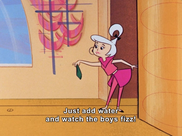 The image features a stylized animated character, depicted in a vibrant pink outfit that aligns with a retro aesthetic. She has a light complexion and a sleek hairstyle, styled with a playful and expressive demeanor. The character is standing in a bright, cartoonish interior, with geometric patterns in the background that add to the whimsical atmosphere.

Her pose conveys a sense of enthusiasm as she holds a small green object, suggesting an invitation to interaction. Overlaying the image is a playful text that reads, "Just add water and watch the boys fizz!" This text adds a layer of humor and intrigue, hinting at a fun or magical scenario.

Overall, the scene exudes a lighthearted, animated charm, perfect for engaging audiences who appreciate nostalgic animation and whimsical storytelling.

#Innuendo #DoubleEntendre #BeachBlanketBingo 