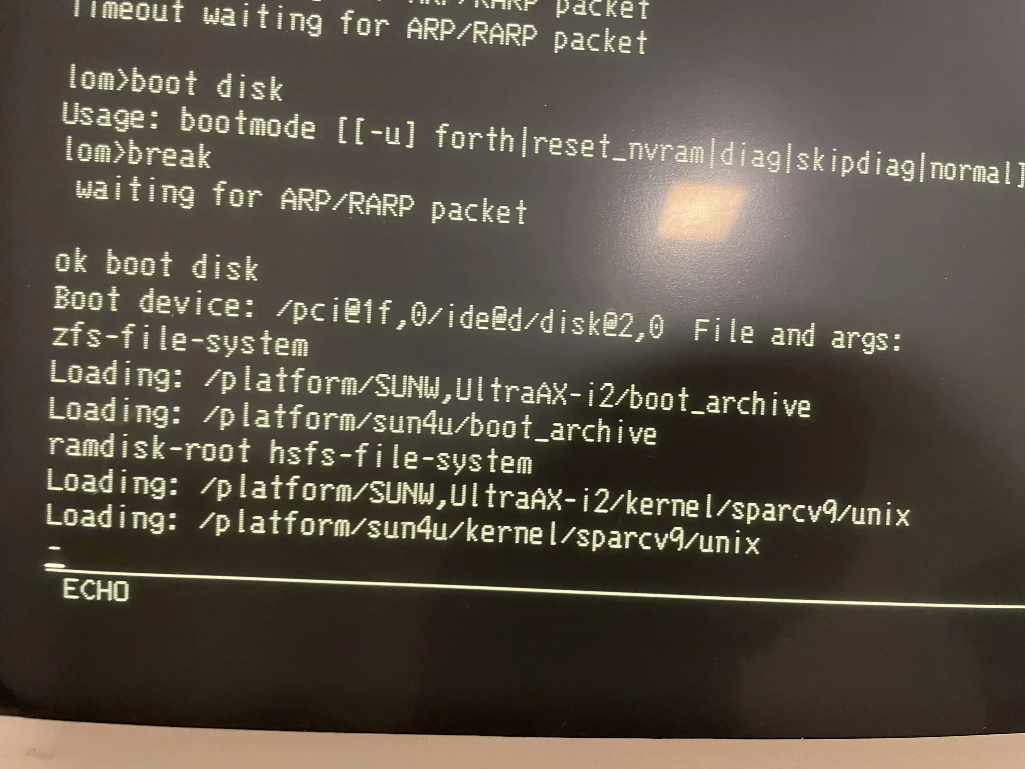 Close up of serial terminal with sun server booting messages