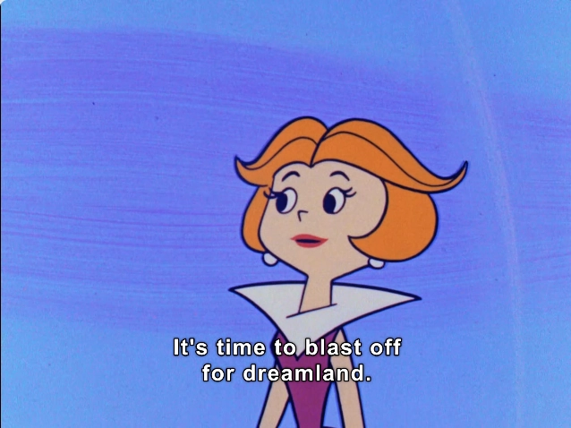 In this vibrant animated scene, a character with a stylish, orange bob haircut is depicted against a soft gradient blue background. She is wearing a distinctive outfit with a high collar, emphasizing her fashionable appearance. The character's facial expression is one of enthusiasm and charm as she prepares to embark on an imaginative journey. The text overlay reads, "It's time to blast off for dreamland," adding a playful and whimsical element to the image. 