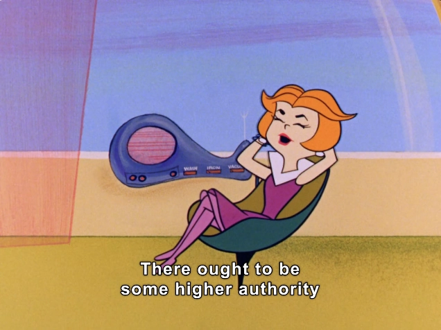In this colorful animation still, a character with vibrant orange hair is depicted lounging comfortably in a modern, curved chair, embodying a relaxed and carefree demeanor. She is dressed in a stylish outfit featuring a purple top and matching stockings, exuding a sense of sophistication and confidence. 

Beside her, a futuristic device resembling a speaker is visible, highlighting the playful, retro-futuristic ambiance of the scene. The background features soft, abstract shapes in warm tones, contributing to a cheerful atmosphere. 

At the bottom of the image, a text caption reads, "There ought to be some higher authority," suggesting a humorous or ironic commentary. The overall aesthetic combines nostalgia with a light-hearted tone, characteristic of mid-20th century animated shows.