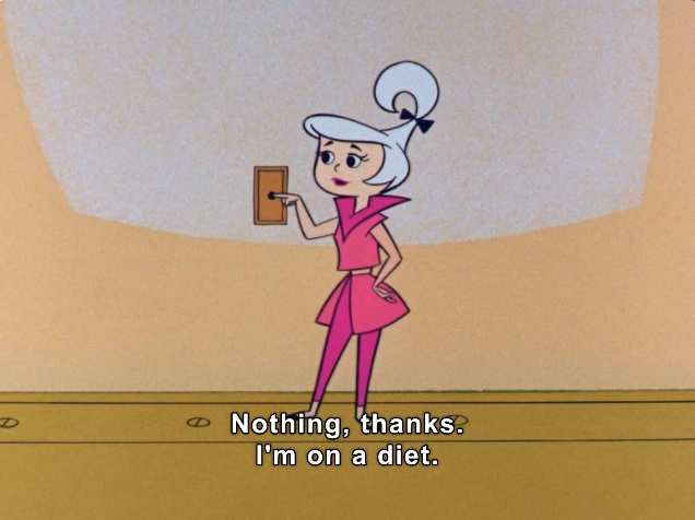 The image features a cartoon character with a stylish, retro appearance, dressed in a vibrant pink outfit. She has short, platinum blonde hair styled in a playful, curly bob with a small bow accent. The character stands confidently, lightly resting her hand on a wall switch as she responds to an unseen character, saying, "Nothing, thanks. I'm on a diet." The background is a soft, muted yellow, creating a cheerful and lighthearted atmosphere. The scene conveys a humorous yet relatable message about dieting and personal choices, capturing the charm of animated sitcoms from the mid-20th century.

#Diet #BodyImage #EatingDisorder #Anorexia 