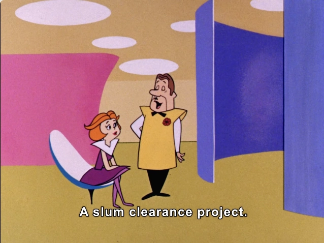 In this vibrant animated scene, two characters are engaged in a conversation within a stylized, colorful environment. The background features soft, rounded shapes in pinks and blues, creating a retro-futuristic aesthetic. One character, with orange hair and a chic outfit, is seated in a modern chair, exuding a sense of curiosity. The other character stands beside her, wearing a bright yellow shirt and animatedly discussing a "slum clearance project." The overall composition reflects mid-century design influences, combining playful colors and whimsical forms that invite viewers into a lighthearted yet thought-provoking dialogue.

#Gentrification #ClassWar