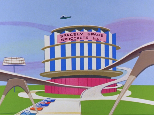 The image depicts a vibrant and whimsical architectural structure known as "Spacely Space Sprockets Inc." The building features a modern design characterized by bold vertical blue and white stripes, creating a striking visual effect. The structure is multi-tiered, with a rounded upper section that prominently displays the company's name in large, playful lettering.

In the foreground, a unique and futuristic roadway curves elegantly, leading towards the entrance of the building, while beneath the elevated pathway, a series of colorful vehicles are parked, enhancing the scene's playful ambiance. Above, a small aircraft can be seen, suggesting an advanced, futuristic setting where aerial travel is commonplace.

The background is painted in soft pastel hues, contributing to an overall cheerful and imaginative atmosphere that resonates with themes of innovation and space exploration. The composition is dynamic, inviting viewers to envision a fantastical world of technology and adventure.