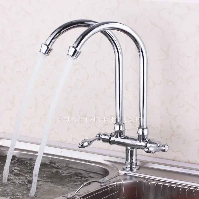 Sink with dual tall gooseneck taps.