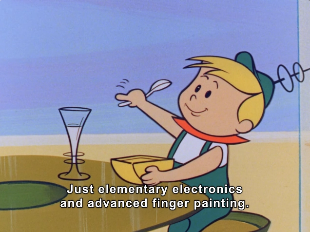 In this colorful animated scene, a cheerful young boy with blonde hair and a light blue cap is seen engaging in a creative activity. He has a spoon in his right hand and appears to be enjoying what he's doing. He is seated at a table, with a yellow bowl in front of him and a tall, clear glass nearby. The background features a soft, blue sky and a light-colored surface, creating a playful atmosphere. A humorous caption below him reads, "Just elementary electronics and advanced finger painting." This image captures a blend of childhood creativity and whimsical spirit.